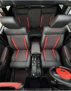 Ολική επένδυση εσωτερικού αυτοκινήτου σε Jeep Rubicon από μαύρο δέρμα με κόκκινες λεπτομέρειες και σχέδιο κυψέλης
